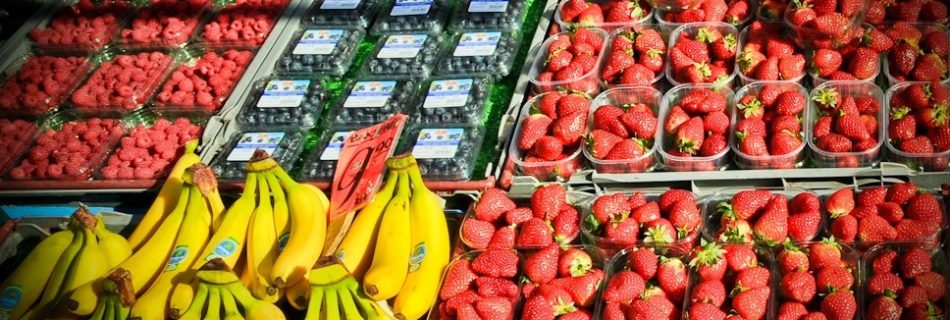 Fruit stand - Banana, Strawberries, Blueberries - Food Photography by Lola Akinmade Åkerström