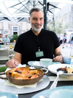 ”I remember as a kid, whenever my mother served my meals, I would bend low to smell it,” Bozidar tells me over homemade Slavonian and Dalmatian tapas at @alamaka_tapas_dubrovnik in the heart of old town. ”What’s wrong with it?!” he remembers his mother asking with a tinge of irritation.

For Bozidar, even as a child, it was the experience of eating, more so than the actual meal. ”Growing food is such a honourable thing and, like love, the process of cooking for someone and sharing a meal together is so personal and intimate,” he says. 

We’re sitting in a 500-year-old-plus building, a former storage cellar, konoba. Over time, people started socializing in a family’s konoba over smoked meats and homemade wine. The most popular houses organically became taverns and the city’s first restaurants. So now, the term konoba is used for any restaurant serving traditional food.
 
As a WSET-3 certified sommelier, Bozidar has been in the travel and hospitality space for over 20 years. Well known as the @croatian_wine_guy (and now, the Croatian @tomhardy), Bozidar guided me around town for some of the best bites including fresh burek (originally Bosnian) at @holyburek, tasty black cuttlefish risotto and brudet (seafood stew) at @kopundbk, and his pick for the best gelato in town, @gianni_dubrovnik, including sampling wines made from Maraština and Pošip grapes.

I heard about the Good Food Festival which celebrates artisans, chefs, and restaurants from all around the region, including hosting an iconic Dubrovnik Table along its Stradun where residents and travellers can dine together in one of the largest yet intimate homecooked tables (get in here, @guinnessworldrecords).

As for Bozidar, he runs a wine club alongside other sommeliers and wine enthusiasts where they do blind tasting to analyze and review various global wines to keep sharpening their instincts. 

Thank you @experiencedubrovnik @grad.dubrovnik.official and @croatiafulloflife for organizing this culinary experience on such short notice, and to Bozidar for your incredible hospitality, invaluable expertise, and warmth. 🇭🇷 ❤️ 

#goodfood #culinary #croatiafulloflife #dubrovnik @hello.dubrovnik @dubrovnikriviera