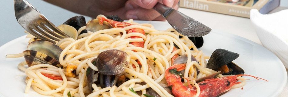 Seafood pasta in Italy - Photography by Lola Akinmade Akerstrom